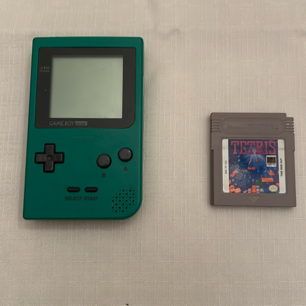 Green Gameboy Pocket with Tetris game.